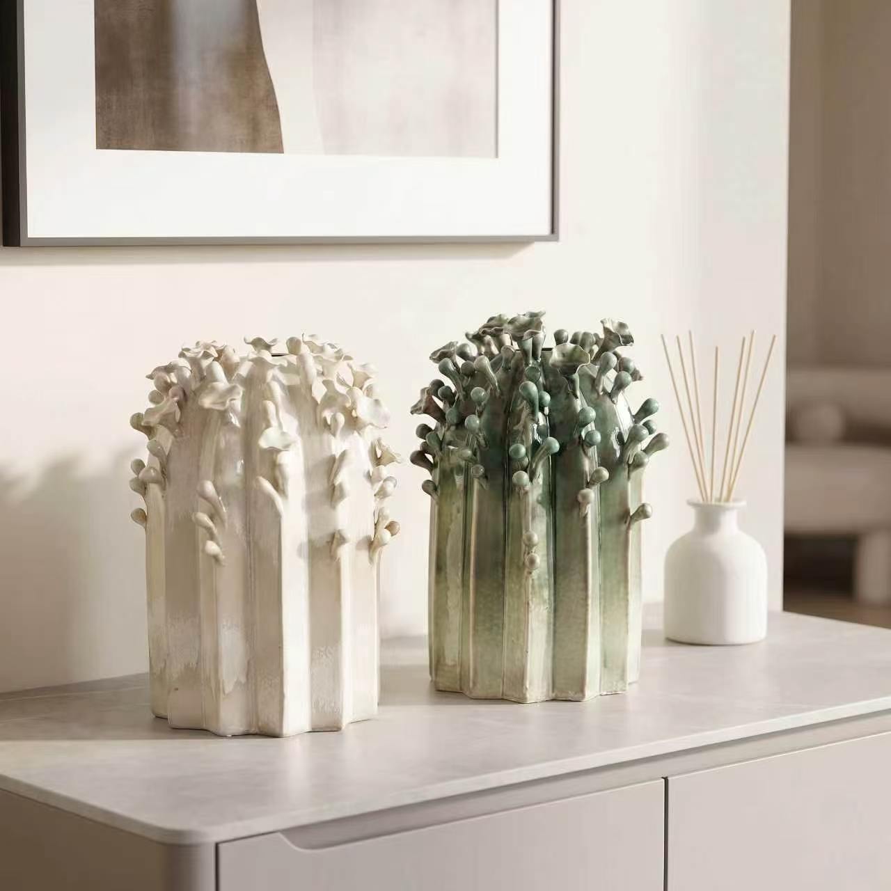 Ivory and sage botanical relief ceramic vases