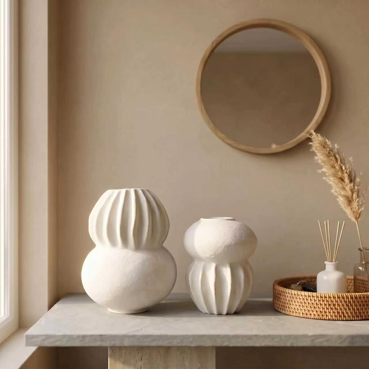 Fluted gourd and sphere vase pair