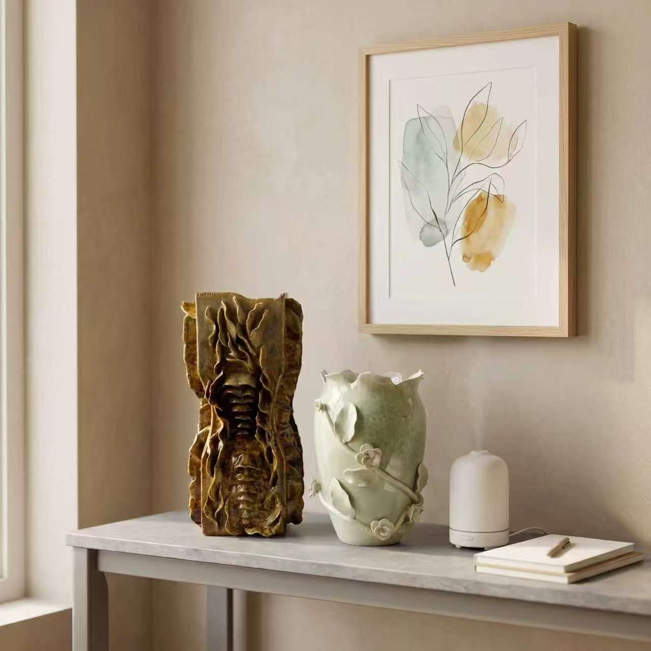 Gold relief vase and green leaf vase