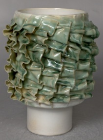 Pleated ceramic flower vessel in the Tongxin ceramic collection