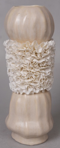 Reactive beige closed-rim ruffle ceramic vase in the Tongxin ceramic collection
